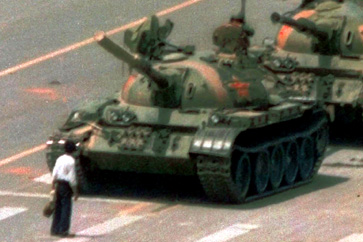 A pro-democracy protester blocks tanks in Tiananmen Square, Beijing, China, on June 4, 1989 [AP]