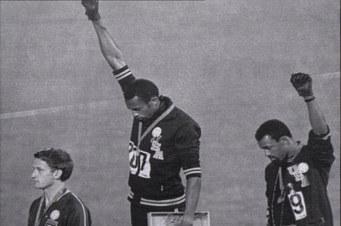 Tommie Smith and John Carlos display the Black Power salute at the Mexico Olympics in 1968 [AP]