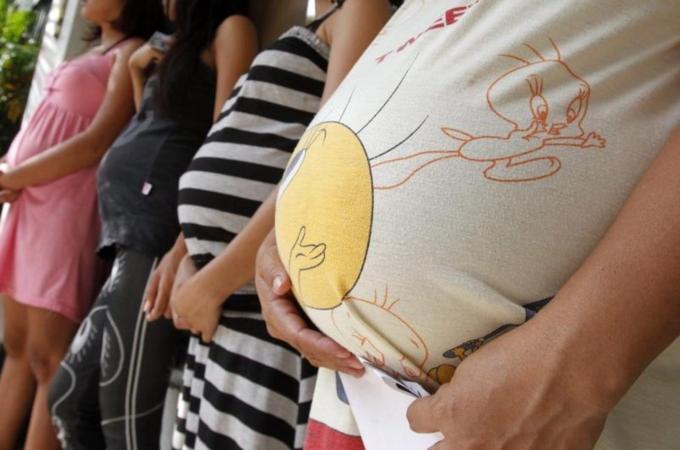 Pregnant women attend lectures on family planning in a local government health centre in Navotas, Metro Manila
