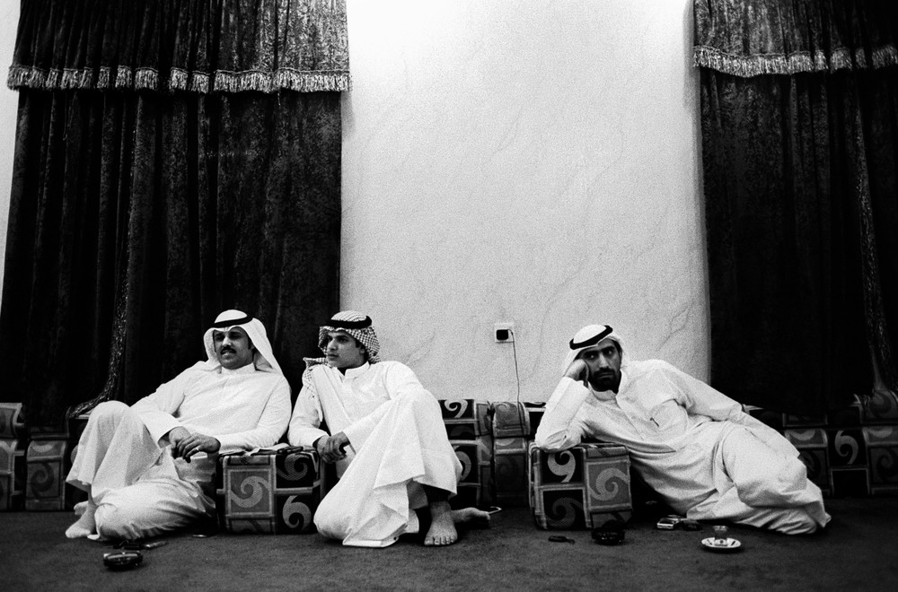 <p>Three men from the Bidoon community sit at a <em>dewaniya</em>, or gathering that is an indispensable feature of a Kuwaiti man(***)s social life.</p>