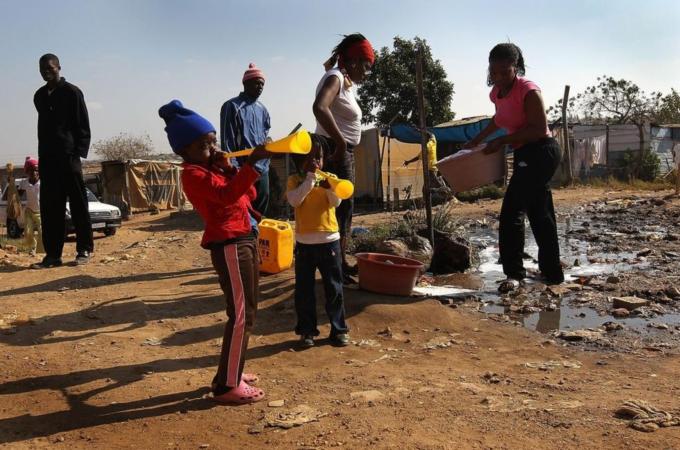 South African Football Fans Gather In Poor Township For World Cup Opening