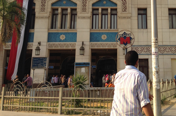 Passengers arrive at the train station in Cairo [Heba Fahmy]