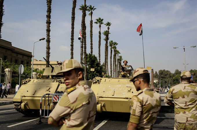 The Egyptian military tightened security ahead of former president Mohamed Morsi's trial [AP]