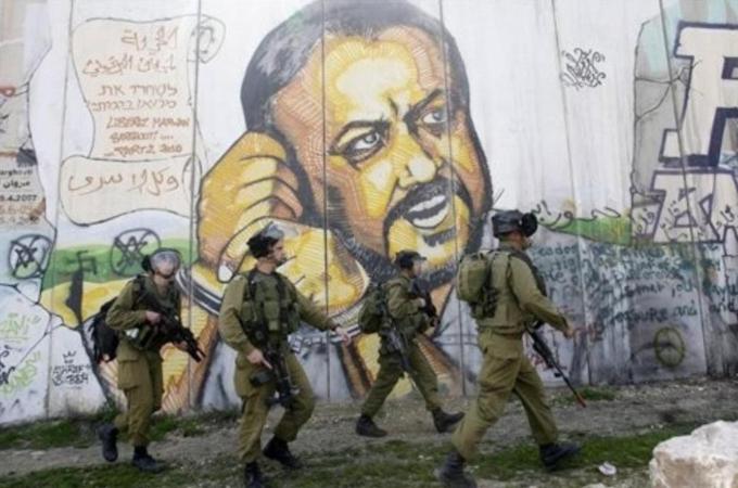 Serving five life sentences behind Israeli jail, Barghouti may yet succeed Mahmoud Abbas as president  [AP]