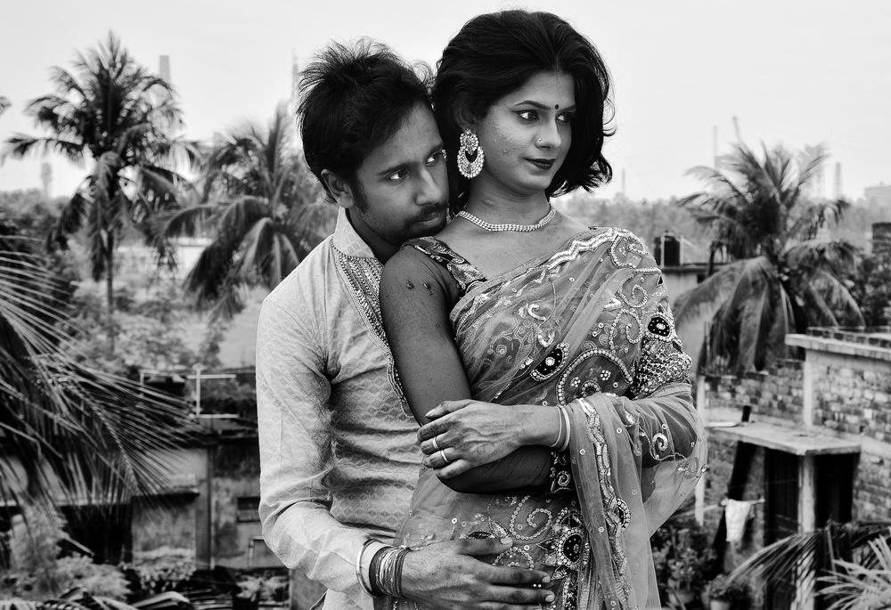 <p>Madhu with her boyfriend Arindam. The couple has been together for quite a few years and live in a suburb of Kolkata in eastern India with their dog.</p>