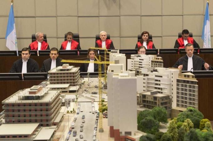 The trial of five men accused of plotting the assassination of former Lebanese Prime Minister Rafik Hariri began on 16 January. [EPA]