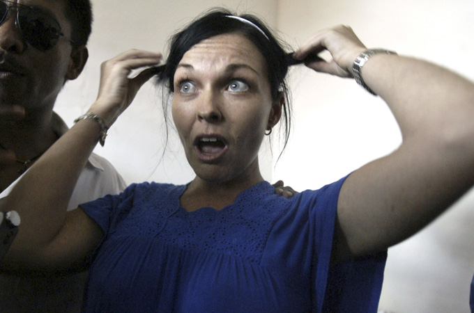 Schapelle Corby, now 36, talks to reporters at Kerobokan prison in Bali, Indonesia in March 2008 [AP]