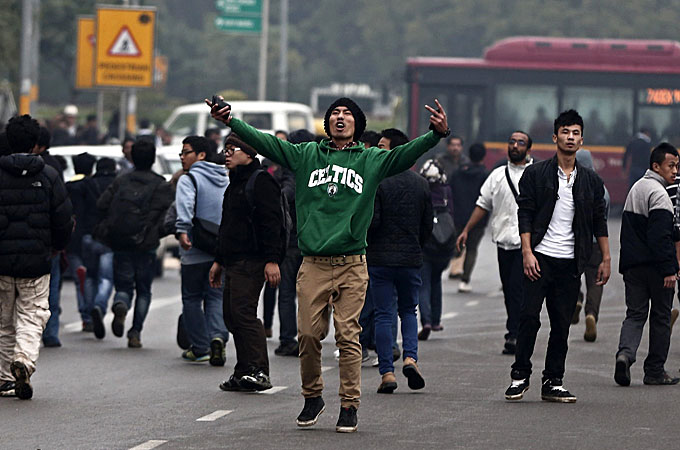 Hundreds of students protested after Nido Taniam was killed in a street brawl [EPA]