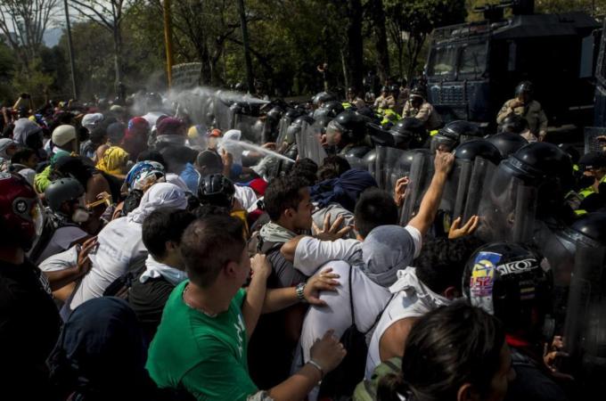 Venezuela has witnessed weeks of violent clashes between anti-government protesters and security forces [EPA]