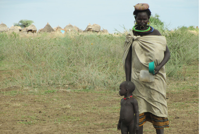 A Toposa speaking woman and her child from Loriwo village in Mogos, a remote area of South Sudan  [Shadow Pictues/Al Jazeera]