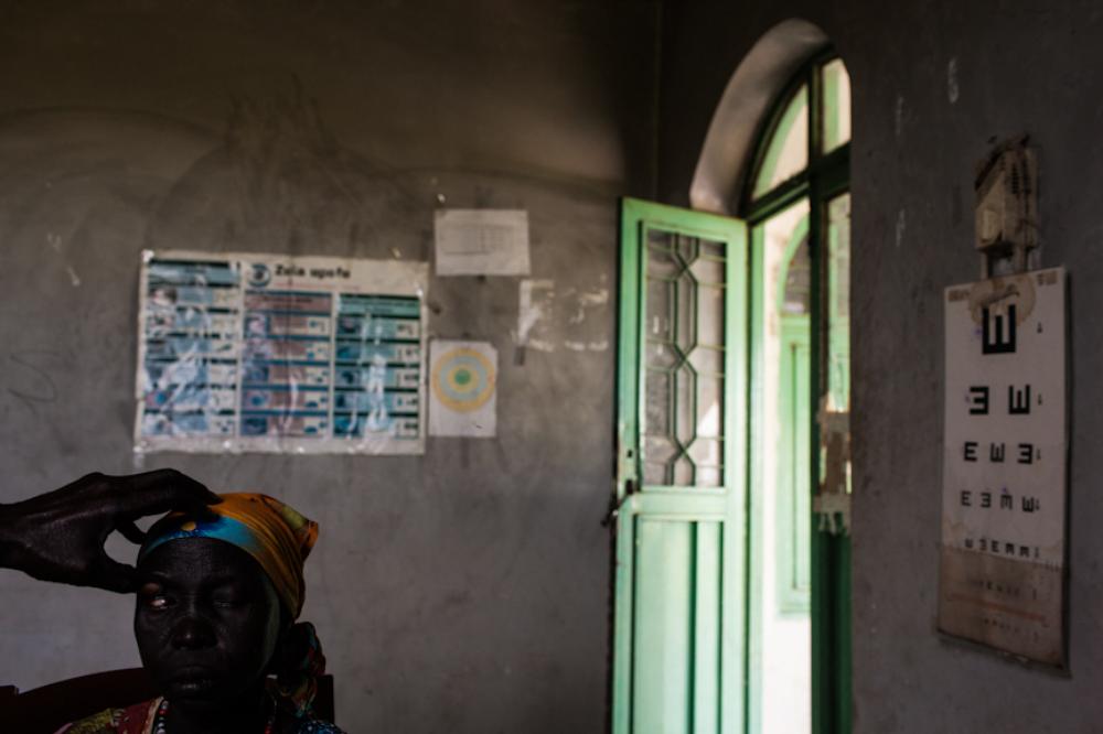 Nyaleni Lual Tut is examined in the consultation room during the cataract and trachoma outreach program in Nasir, Upper Nile, South Sudan, on August 30, 2013