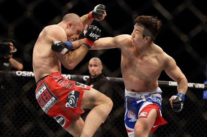 Through social media, UFC fights are marketed to homes as far as Britain and China [GALLO/GETTY]