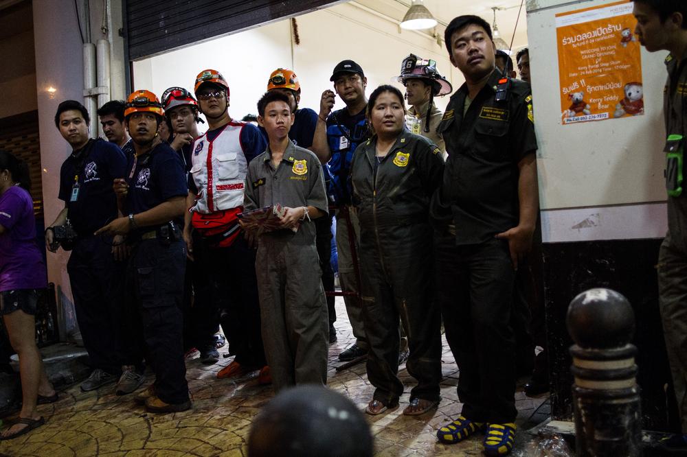 <p>Ruamkatanyu Foundation<span style="font-size: 14px;"> </span>volunteers and other medical and rescue teams wait for an emergency call at their meeting point while revellers enjoy the Thai New Year, Songkran. In addition to the personnel from the foundation, the base has firemen, paramedics and rescue service teams. All of them are volunteers.</p>