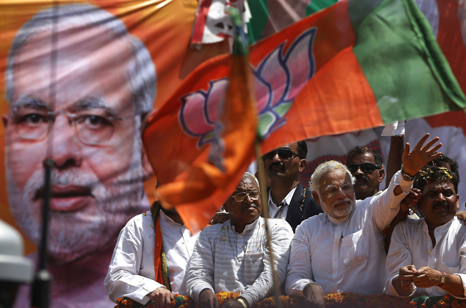 Varanasi has been bustling with campaigners for the AAP and the BJP [Reuters]