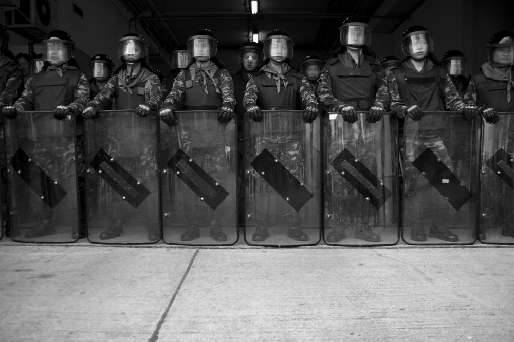<p>Thai soldiers stand guard at the Department of Defense, home to the office of prime minister Yingluck Shinawatra, moments after she was removed from her position last Wednesday. Thailand has been in a state of intense political turmoil over the past six months as an anti-government movement has taken to the streets of Bangkok, demanding the removal of Yingluck and her ruling Pheu Thai party. </p>