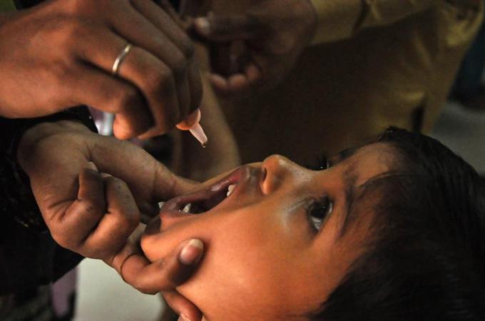 The WHO has imposed travel restrictions on Pakistanis after a spike in polio cases [EPA]