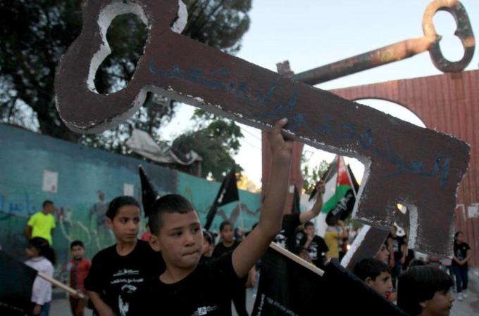 Remembrance is a political act of resistance, writes Alyan [AFP/Getty Images]