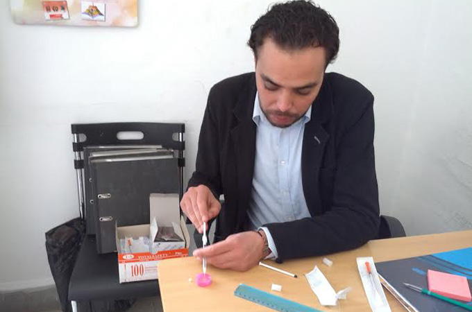 Users of Subutex crush the pill and dissolve it in water before injecting it [Robert Joyce/Al Jazeera]