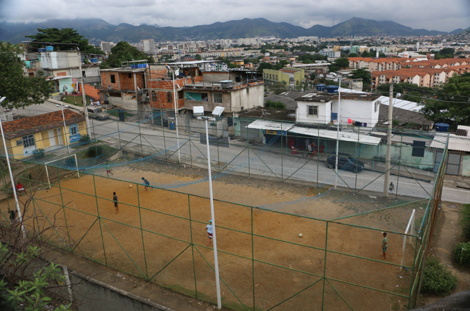Children play soccer in a Rio de Janeiro favela days before World Cup is set to begin [Flora Charner/Al Jazeera]
