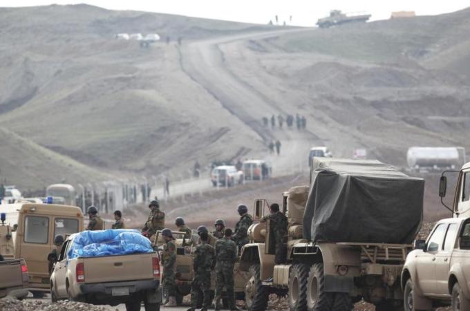 Kurdish Peshmerga troops are deployed on the outskirts of Kirkuk [AP]