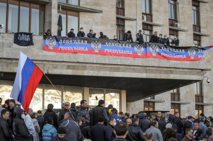 A pro-Russian crowd attacked the regional administration office in Donetsk and declared an 'independent Donetsk republic' [EPA]