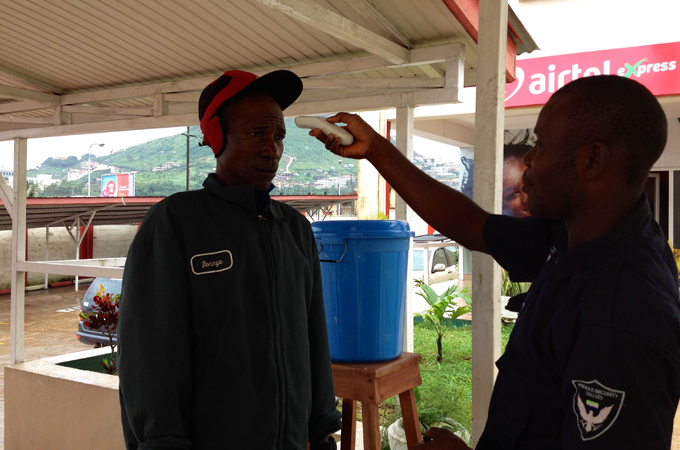 A man in the Sierra Leone capital Freetown is being screened for Ebola [Nina Devries/Al Jazeera]