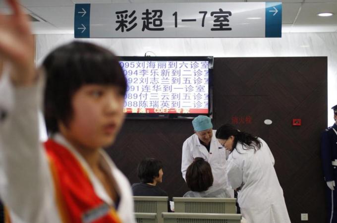 China's state-run facilities are woefully inadequate to deal with increasing demand for primary healthcare [EPA]