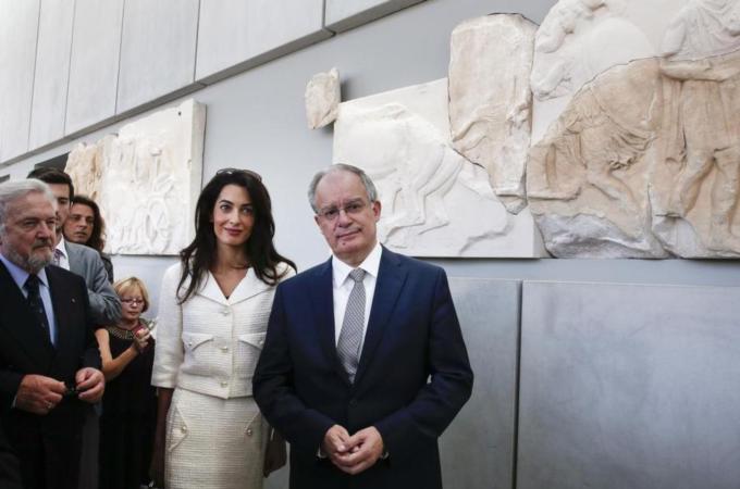 Amal Alamuddin Clooney and Greece's Minister of Culture and Sports inside the Acropolis museum [Reuters]