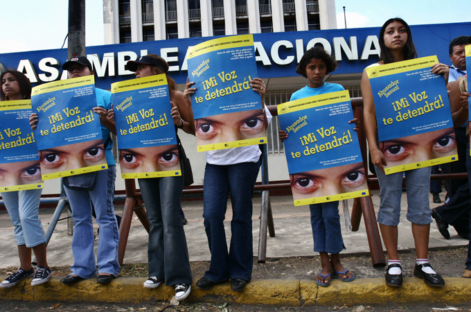 Nicaraguan girls protest against sexual abuse in front of the National Assembly in Managua [AP]