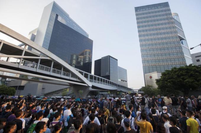 The protesters in Hong Kong oppose China's decision to restrict open elections in the territory [EPA]