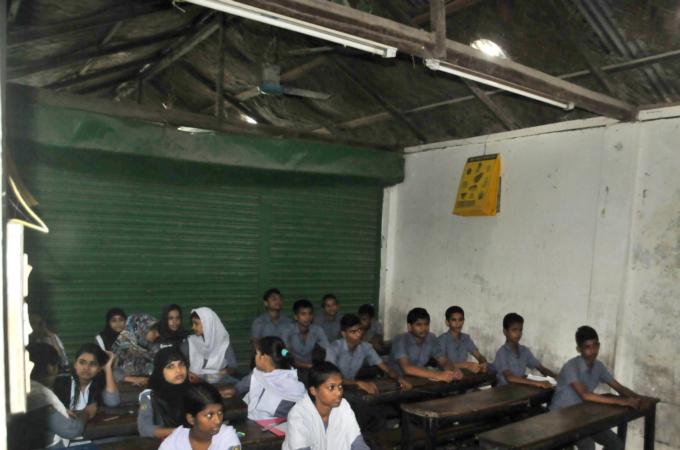 The cost of installation along with raw materials is now Tk 300 [$4] per light [Sourav Laskar/Al Jazeera]