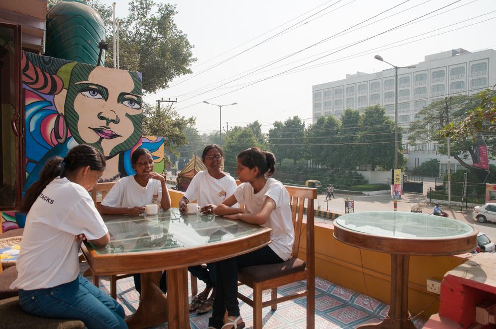 <p>Staff members take a moment before starting their day at the cafe. According to an ACID Survivors Foundation India [ASFI] report, there have been 518 recorded cases of acid attacks from January 2010 to July 2014.</p>
