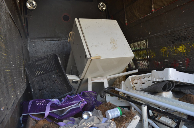 The Jordanian government deems the work of trash pickers to be illegal [Elizabeth Whitman/Al Jazeera]