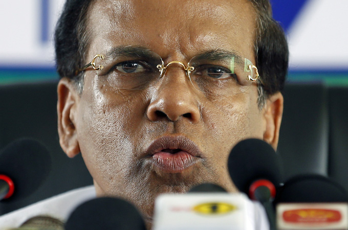 Sri Lanka's presidential candidate Mithripala Sirisena addresses the nation at his party's office [Reuters]