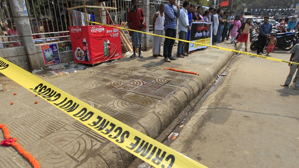 Roy and his wife were coming from a book fair at the university when the attack happened [Mahmud Hossain Opu/Al Jazeera]