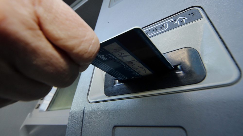 Inserting credit card into ATM