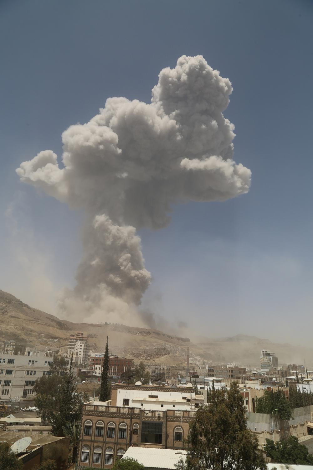 A large cloud of smoke resulting from an air strike on the Faj Attan base is seen from about 5km away.