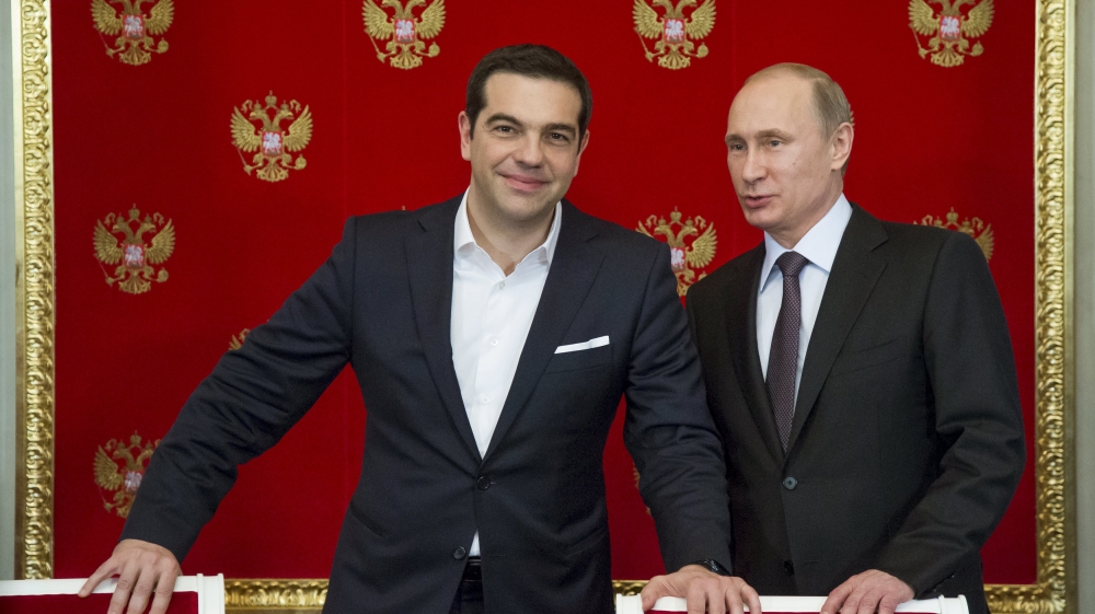 Putin and Tsipras attend a signing ceremony at the Kremlin in Moscow [REUTERS]