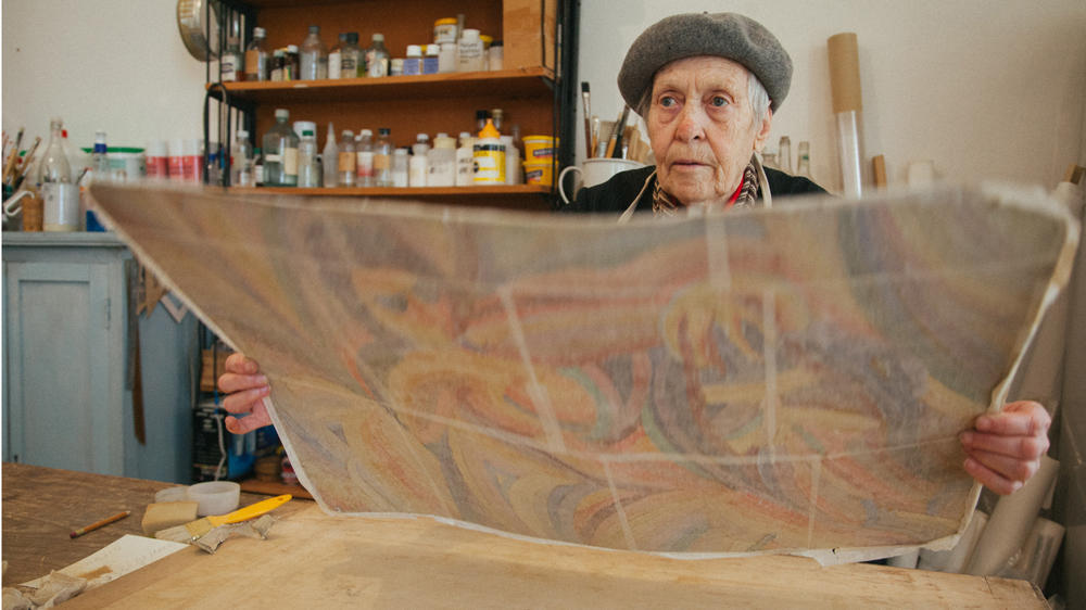 Alvina Spady, head restorer at the Savitsky museum, said there is plenty of work to be done to salvage the precious art at the depository of the museum [Timur Karpov/Al Jazeera] 