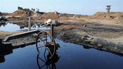 Pools of oil with damaged oil pipeline infrastructure in Iraq [Getty]