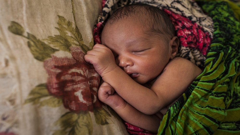 One week old baby Khalid was born via caesarian section to his paraplegic mother at Banadir Hospital in Mogadishu [Adriane Ohanesian] 