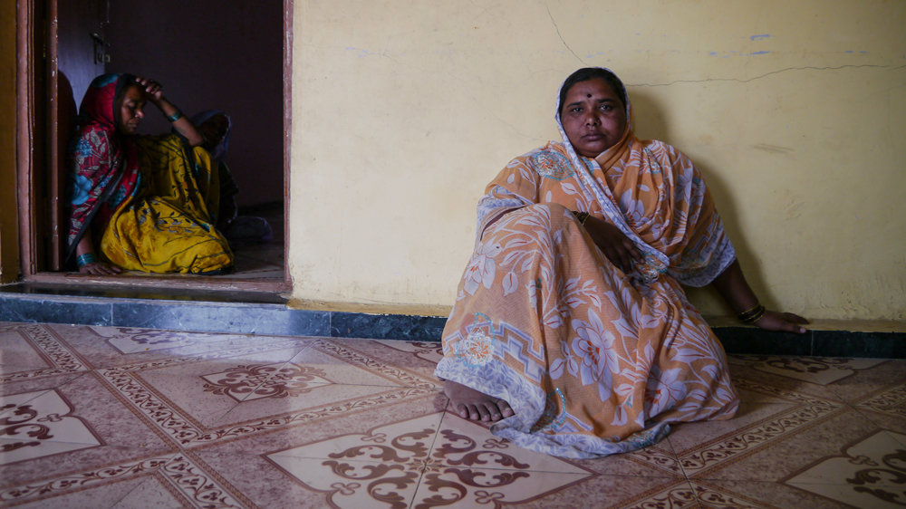 Ghadwaje's wife and mother of three Chaya (right) is now a widow with a hefty loan to repay [Baba Umar/Al Jazeera]