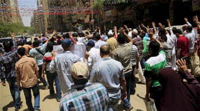 Morsi supporters rally against an Egyptian court's decision [Reuters]