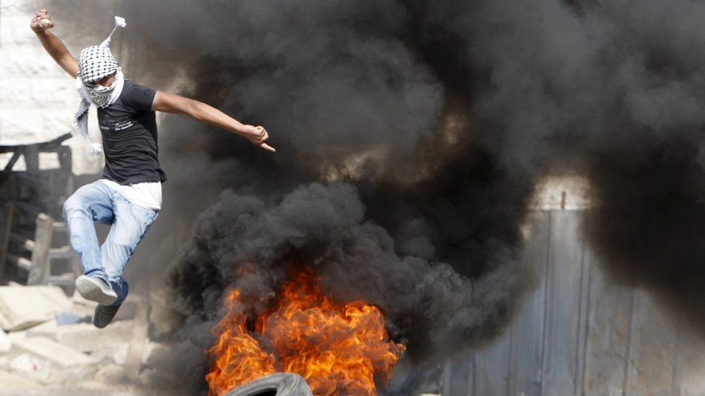 Palestinians clashed with Israeli troops in the West Bank on Friday following the funeral of  Ali Saad Dawabsheh [Reuters]