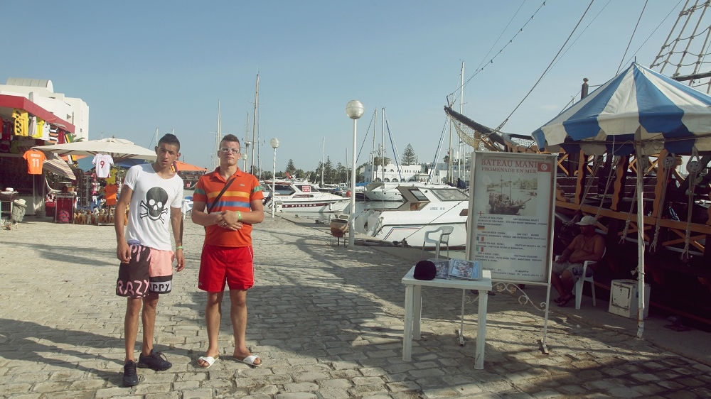 Algerian friends Haoulhat Abderazak, 19, and Mohamed Maameche, 21, have been to Sousse before and feel perfectly safe here [Al Jazeera]