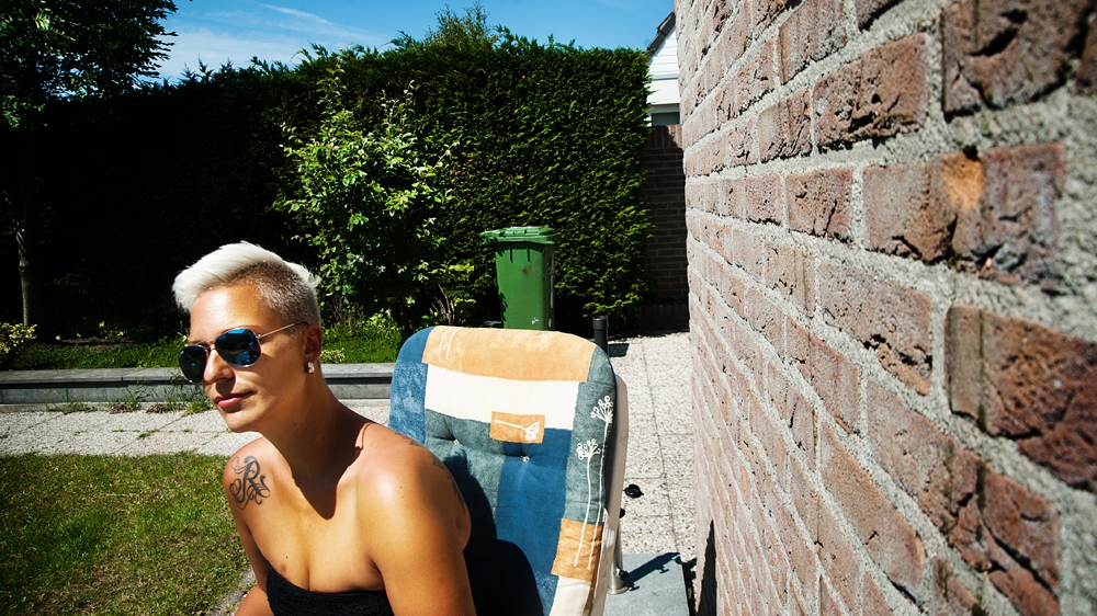 Twenty-six-year-old Jacky is a sex worker and a mother of two [Mona van den Berg]