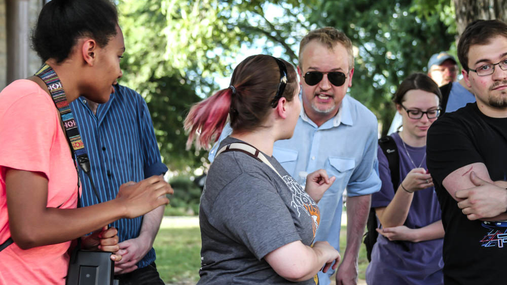 Tensions were high between monument defenders and protesters [Shaghayegh Tajvidi /Al Jazeera]
