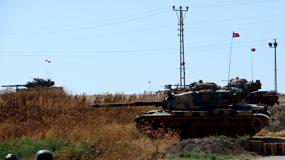 Turkish tanks take security measures on border with Syria