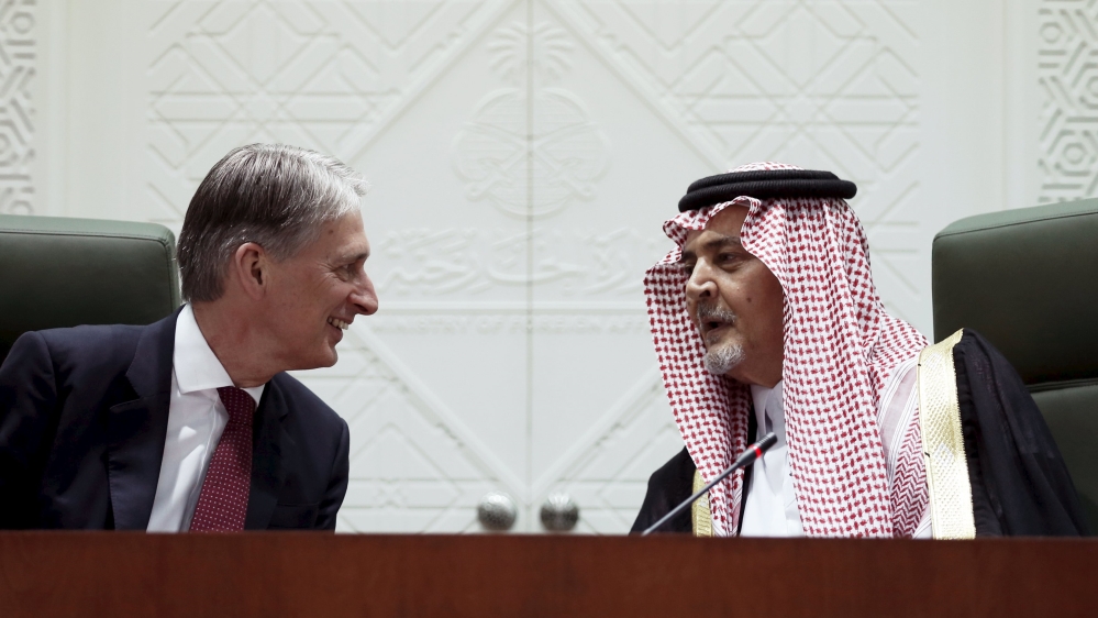 Saudi Foreign Minister, Prince Saud al-Faisal and British Foreign Secretary Philip Hammond talk during a news conference in Riyadh