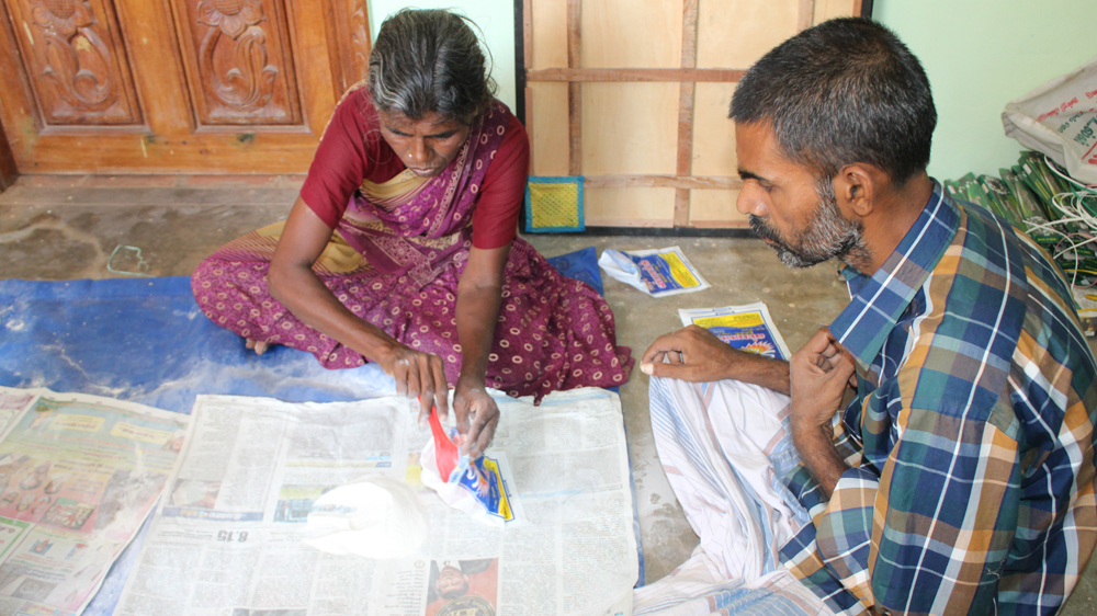 Patients pack cleaning powder as part of the rehabilitation programme for the mentally ill [Sandhya Ravishankar/Al Jazeera]
